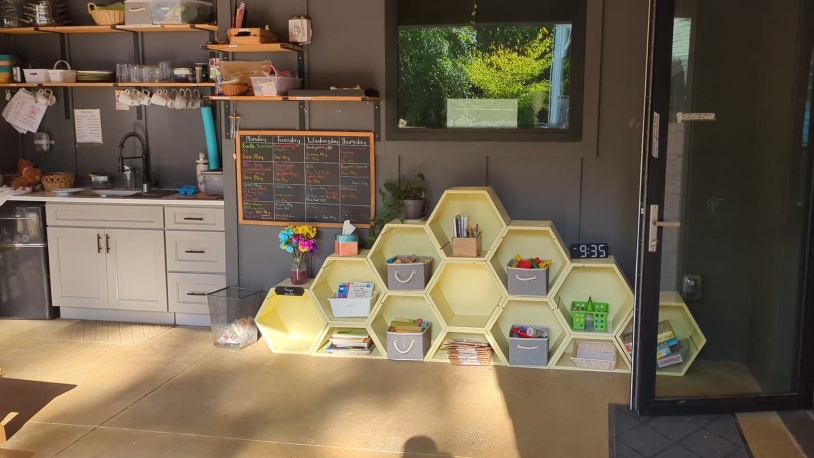 Yellow hexagon cubbies in the outdoor kitchen